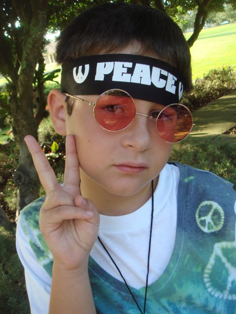 child dressed in hippie attire for halloween