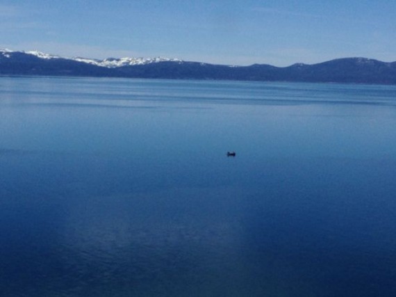 small boat alone in wintery Lake Tahoe
