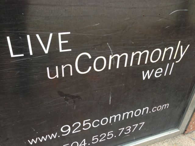 live uncommonly well sign