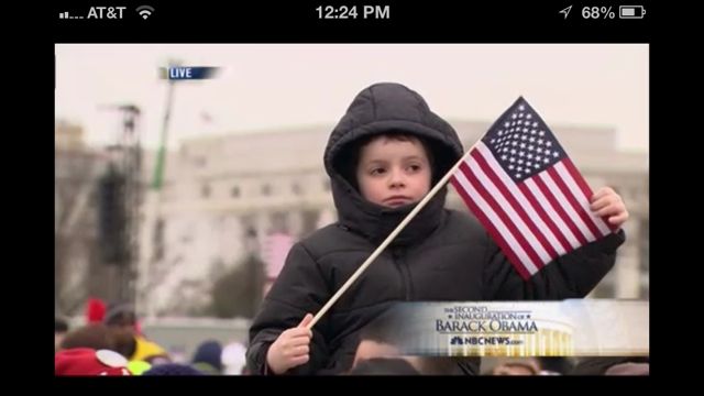 A boy and an American Flag on Inauguration day