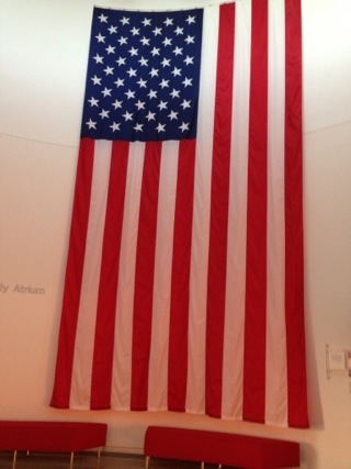 Giant American flag hanging on wall