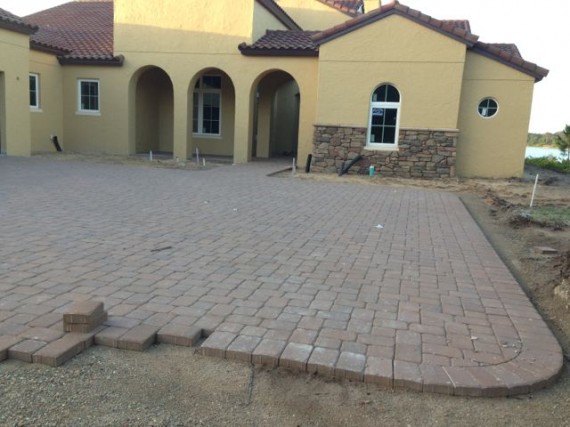 brick driveway being laid out at Orlando home