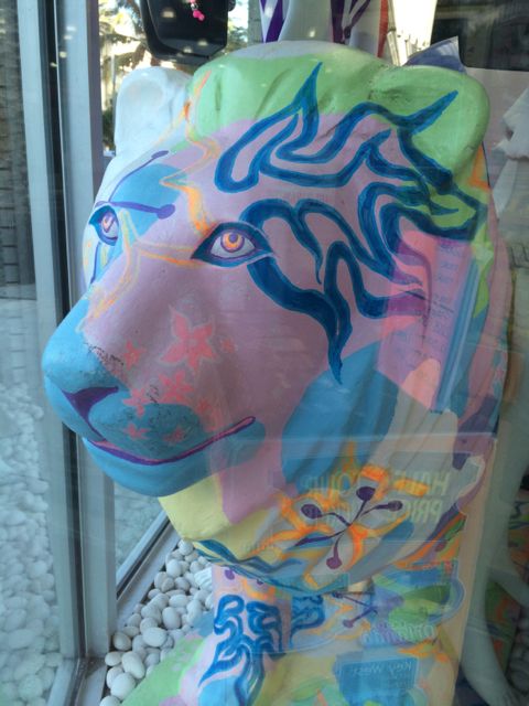 Colorful lion figure in South Beach store front window