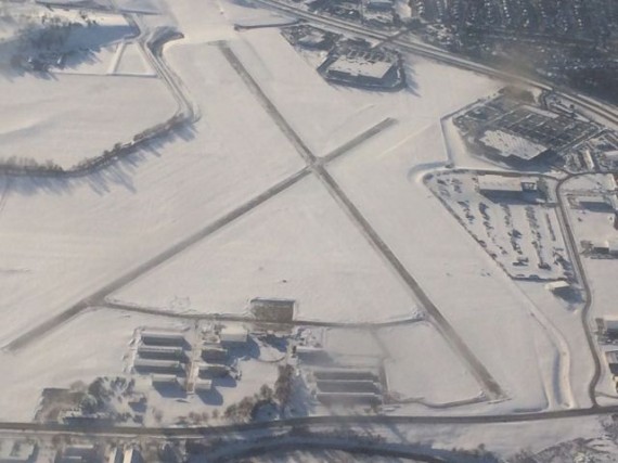 small Iowa airpot covered in snow, ariel view