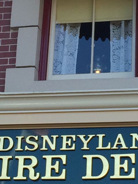 Walt Disney's Apartment window lamp light above Disneyland's Firestation