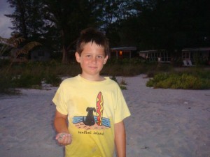 Young boy on annual Summer trip to Sanibel Island