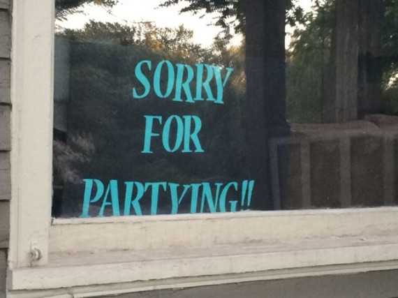 Sorry For partying sign in campus apartment window