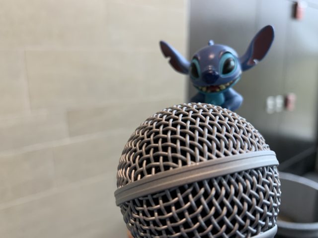 Stitch at a microphone