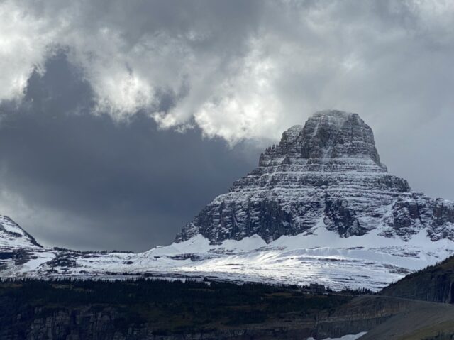 Mountain with snow and dark sky