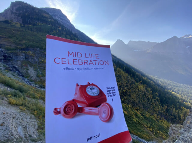 The book mid life celebration in a mountain backdrop