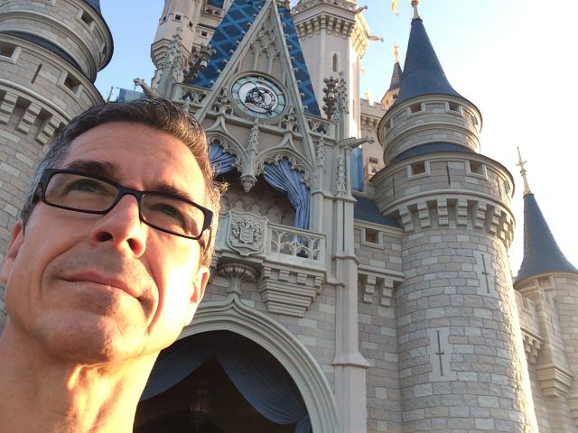Disney speaker Jeff Noel in front of Cinderella Castle