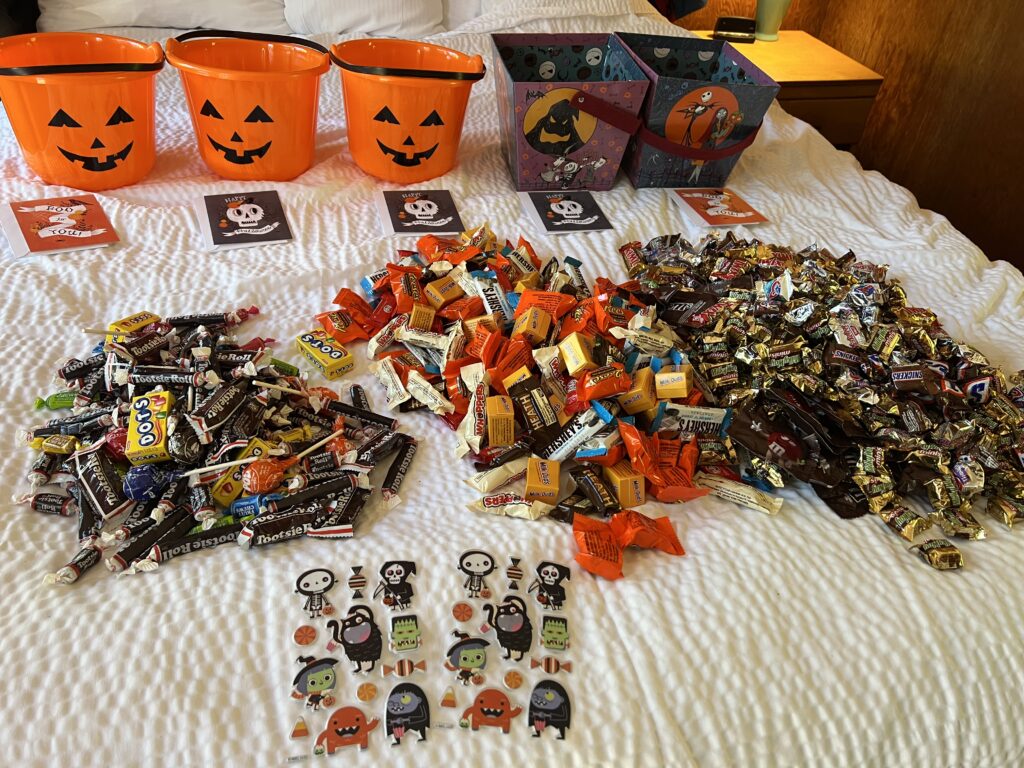 Halloween candy on a bed