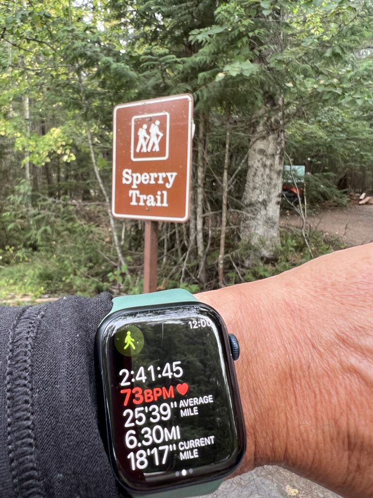 Apple Watch at trail head sign