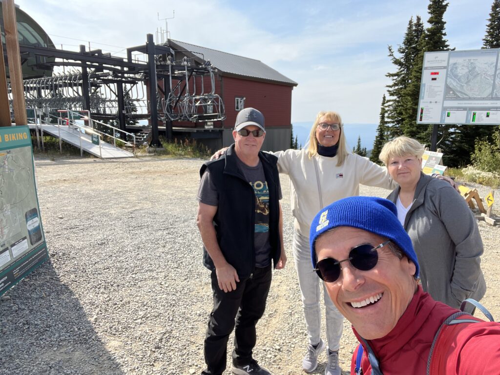 Four people at a ski left