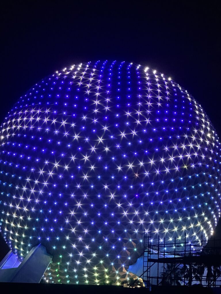 Epcot’s spaceship Earth at night