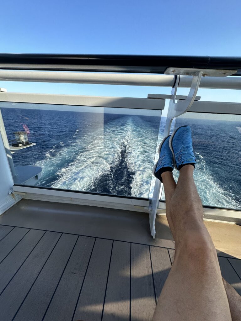 Person with feet up on a cruise ship