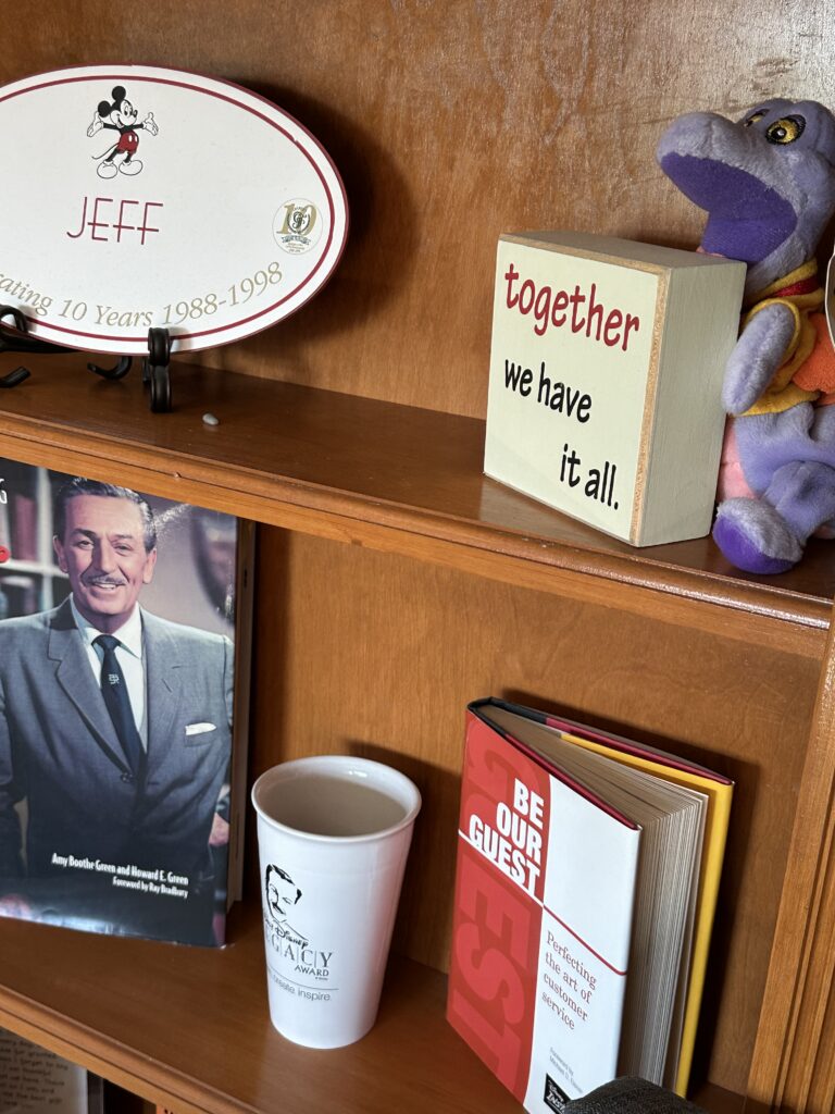 Bookshelves with Disney memorabilia 