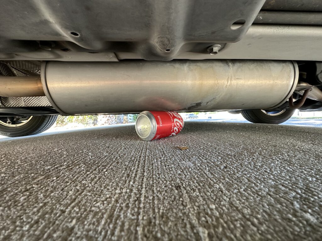 coke can under a car