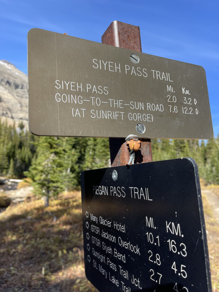 mountain trail signage at trail head
