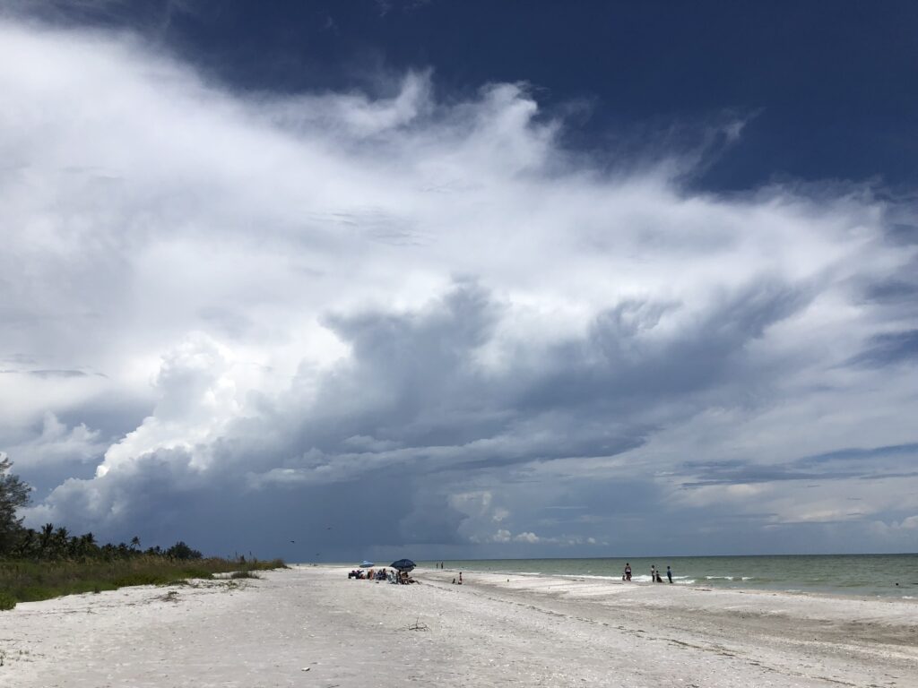 Beach and thunderstorm clouds from a distance
