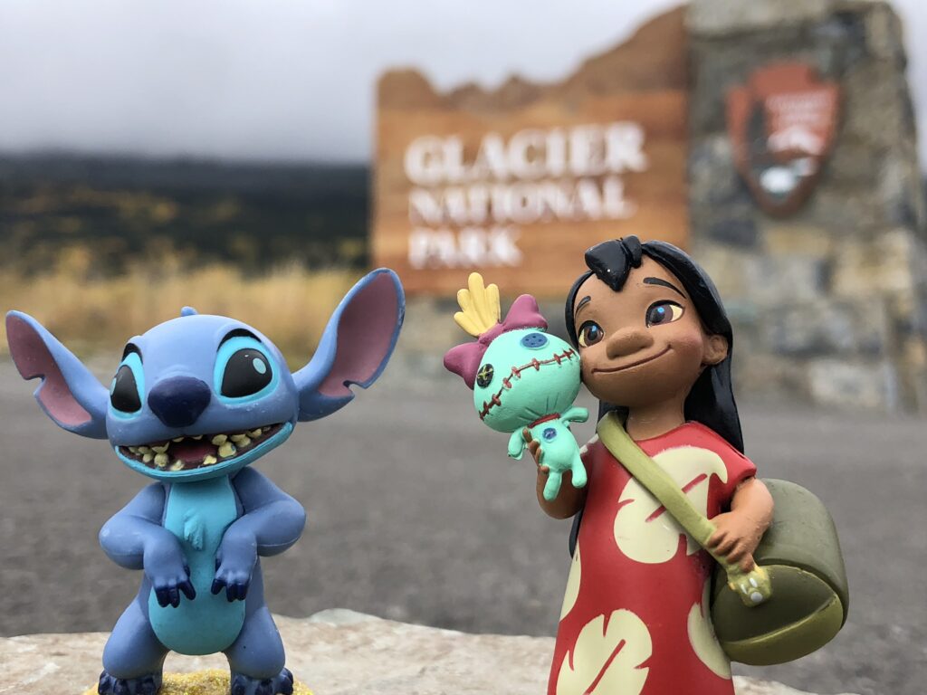 Small Lilo and Stitch figurines in the mountains 
