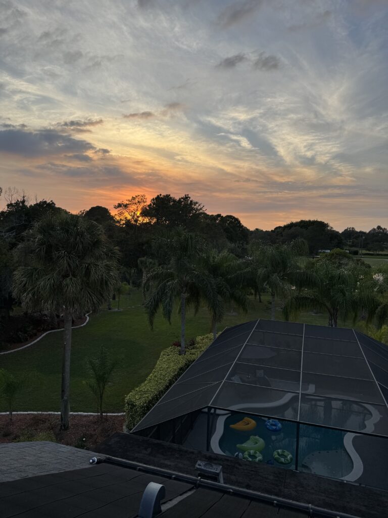 Sunset from a homeowners rooftop