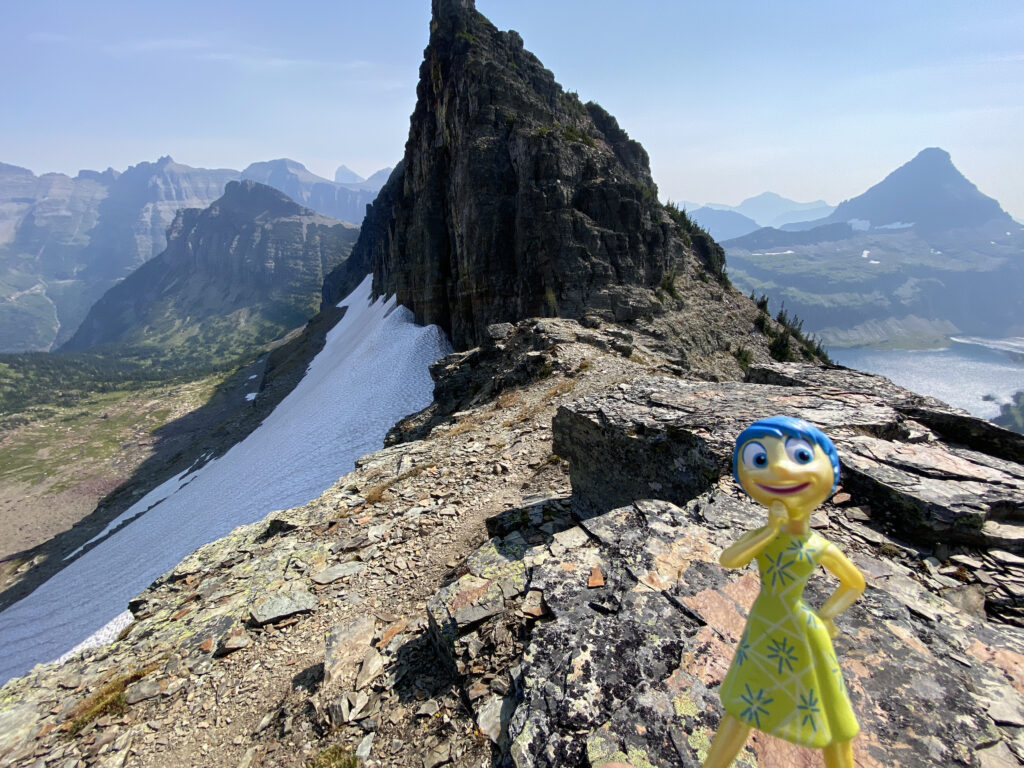 mountains and Disney figurine