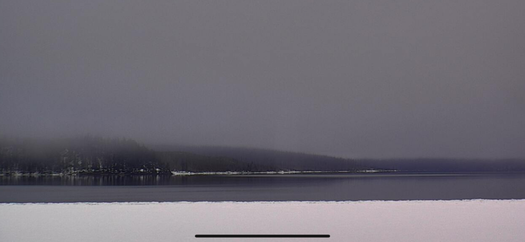 frozen lake with low clouds
