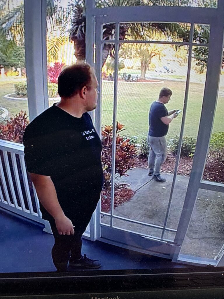 Two men on a home security camera