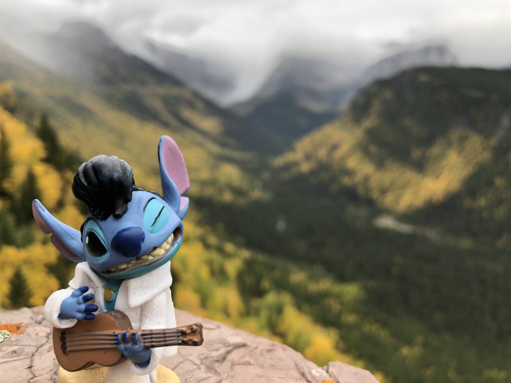 Disney Stitch toy figure in the mountains 