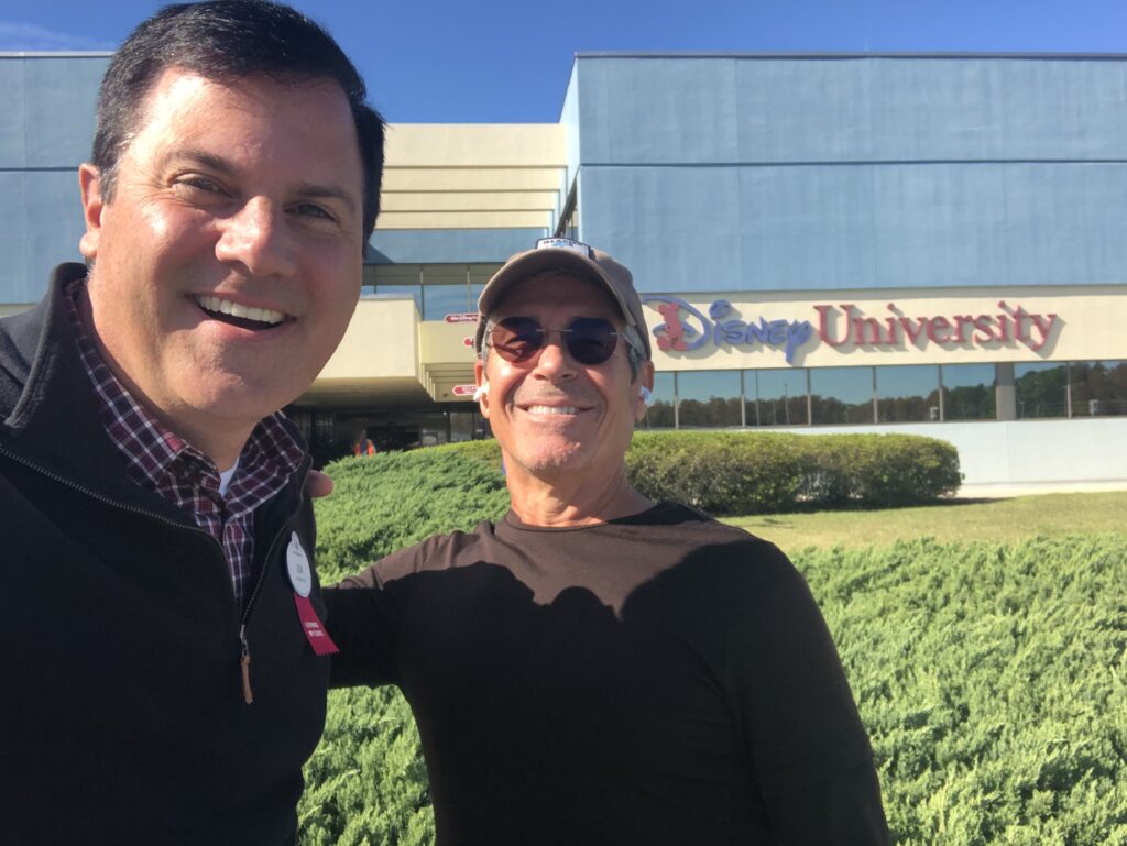 two men next to Disney University