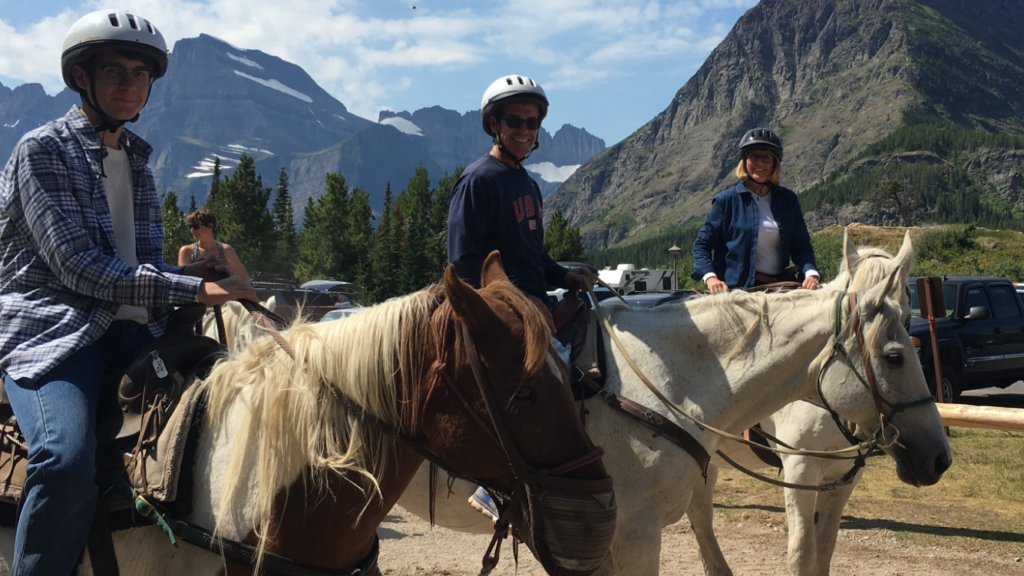 three horseback rider in Glacier National Park